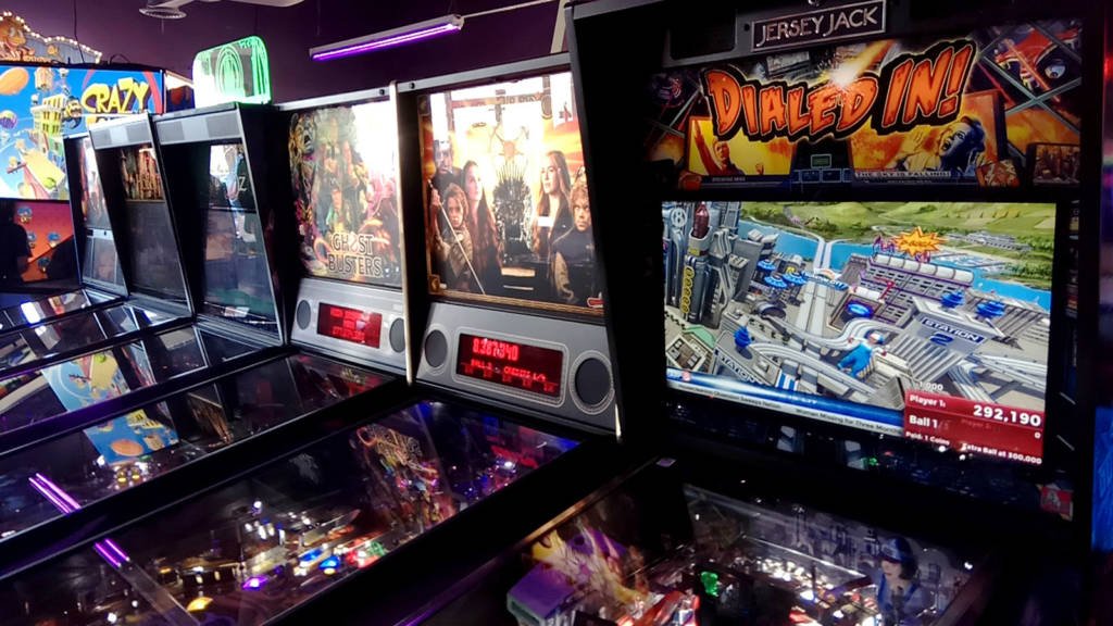 The first row of six pinball machines
